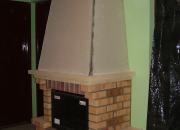 tégla burkolattal épített kandalló